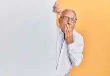 man in white dress shirt wearing black framed eyeglasses