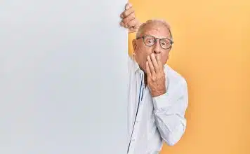 man in white dress shirt wearing black framed eyeglasses